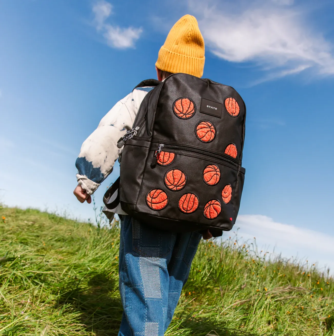 KANE DOUBLE POCKET OVERSIZED FUZZY BASKETBALLS BACKPACK